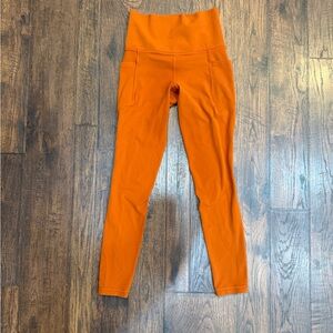 Athleta Salutation Stash Pocket II 7/8 Tight